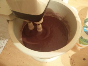 The cake mixture being mixed