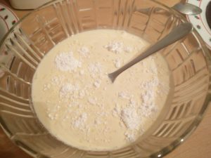 The sugar and whipping cream after a few minutes of stirring
