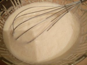 The whipping cream and sugar slightly more whipped