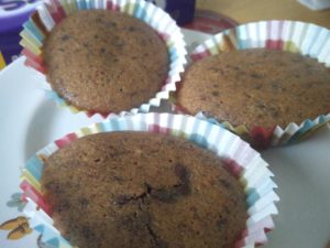 Some of the cupcakes on a plate, ready to be eaten