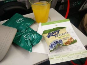 The drink and pretzels handed out during the bar service