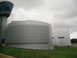 The tower of the Steven F. Udvar-Hazy museum, with the outside of the hangars